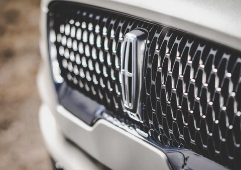 The grille of the 2024 Lincoln Aviator® Reserve model with an eye-catching repeated field of Lincoln Star logo shapes | Kindle Lincoln in Cape May Court House NJ